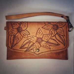 Naked floral envelope clutch with wrist strap