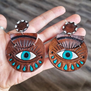 Leather magic eye earrings